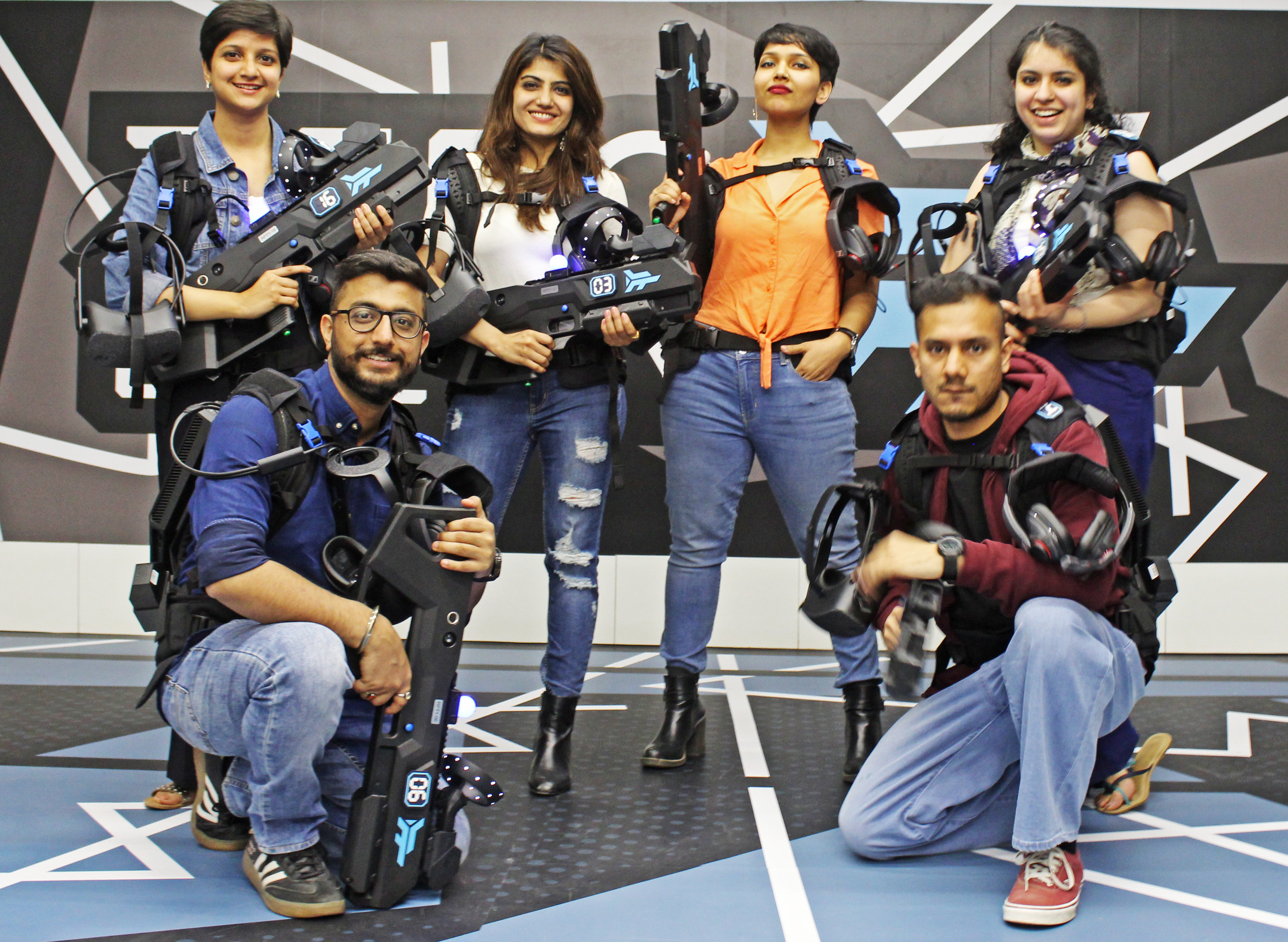 Group of friends after a Zero Latency free roam VR game at Microgravity
